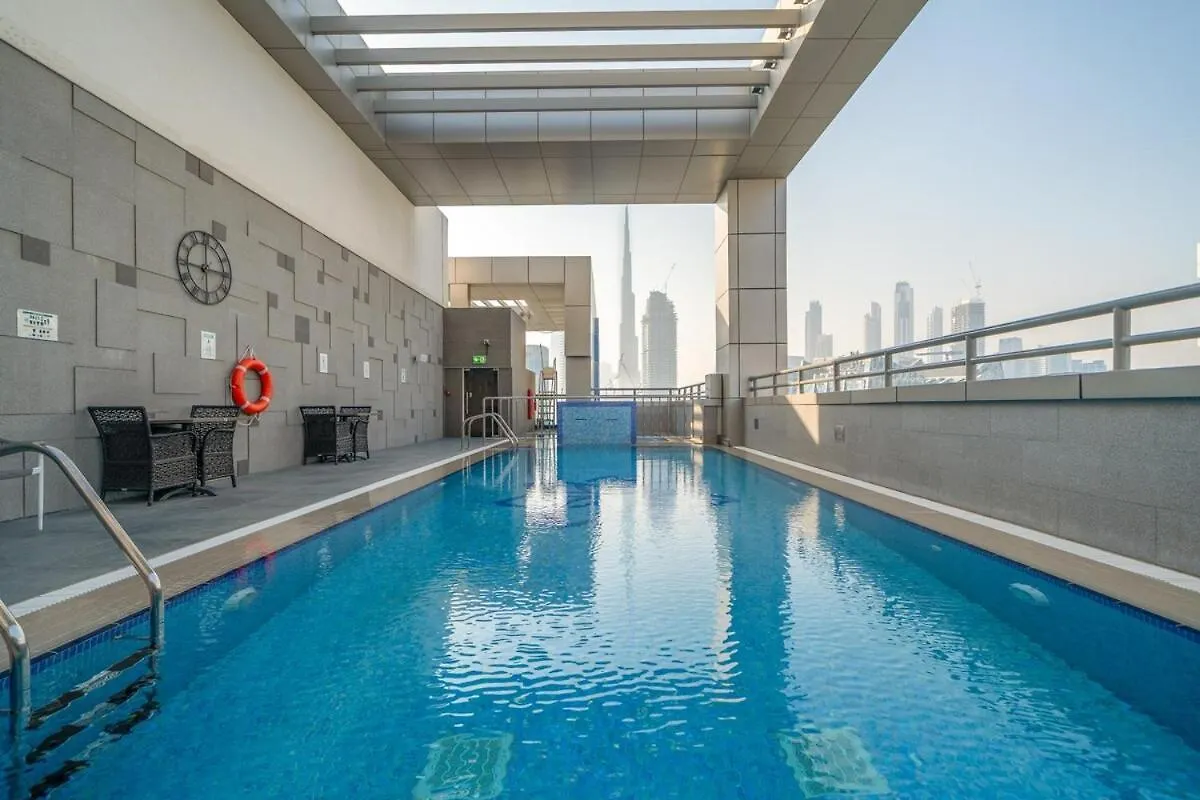 Apartment Cozy 1Br W & Infinity Pool, Gym, Canal & Burj Views Dubai